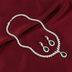 Rhodium necklace and earring set featuring champagne pear zircon gems by Bound Jewels, elegantly displayed.