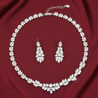 Rhodium-plated zircon necklace and earring set from Bound Jewels, showcasing a floral wreath design.