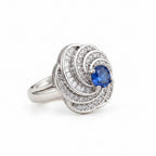 Rhodium spiral baguette zircon ring by Bound Jewels, showcasing elegant design and sparkling gemstones.