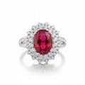 Delicate oval 3A zircon ring in rhodium by Bound Jewels, showcasing intricate design and sparkling stones.