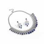 Floral petal zircon choker and drop earring set in rhodium by Bound Jewels, showcasing intricate design and sparkling details.