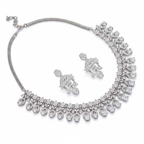 Bound Jewels floral petal zircon choker and drop earrings set in rhodium, showcasing intricate designs and sparkling details.