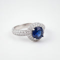 Rhodium-plated Bound Jewels zircon solitaire pave bezel ring with sparkling stones and elegant band design.