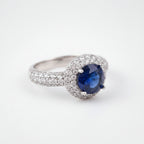 Rhodium-plated Bound Jewels zircon solitaire pave bezel ring with sparkling stones and elegant band design.