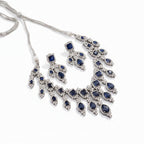 Rhodium-plated Bound Jewels zircon choker and earring set featuring wide drop design and sparkling accents.