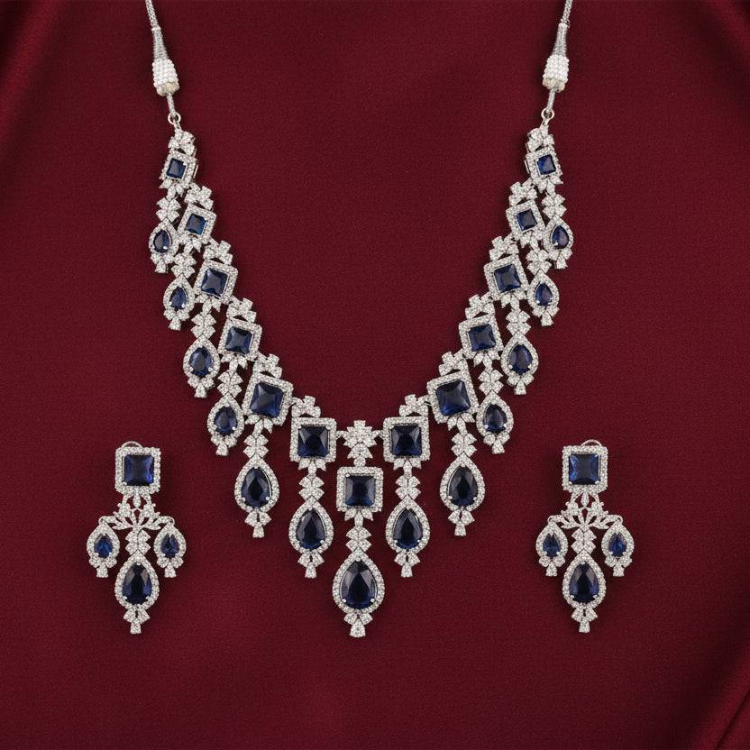 Rhodium-plated Bound Jewels Royal Wide Drop Zircon choker and earring set displayed on a neutral background.