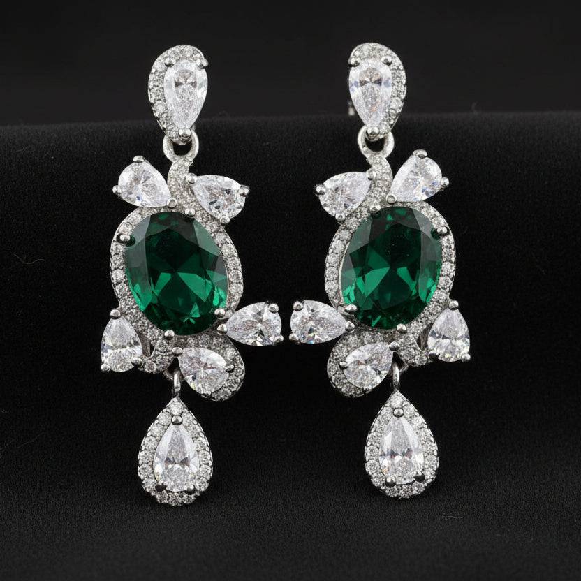Rhodium drop earrings featuring sparkling zircon stones by Bound Jewels, elegantly designed for a sophisticated look.