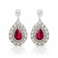 Rhodium drop-shaped earrings featuring luxury zircon stones by Bound Jewels, elegantly designed for a refined look.