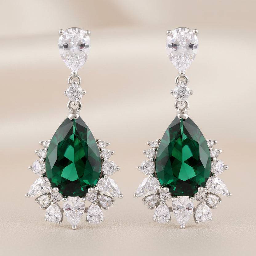 Rhodium-plated drop earrings featuring sparkling zircon stones by Bound Jewels, elegantly designed for a luxurious look.