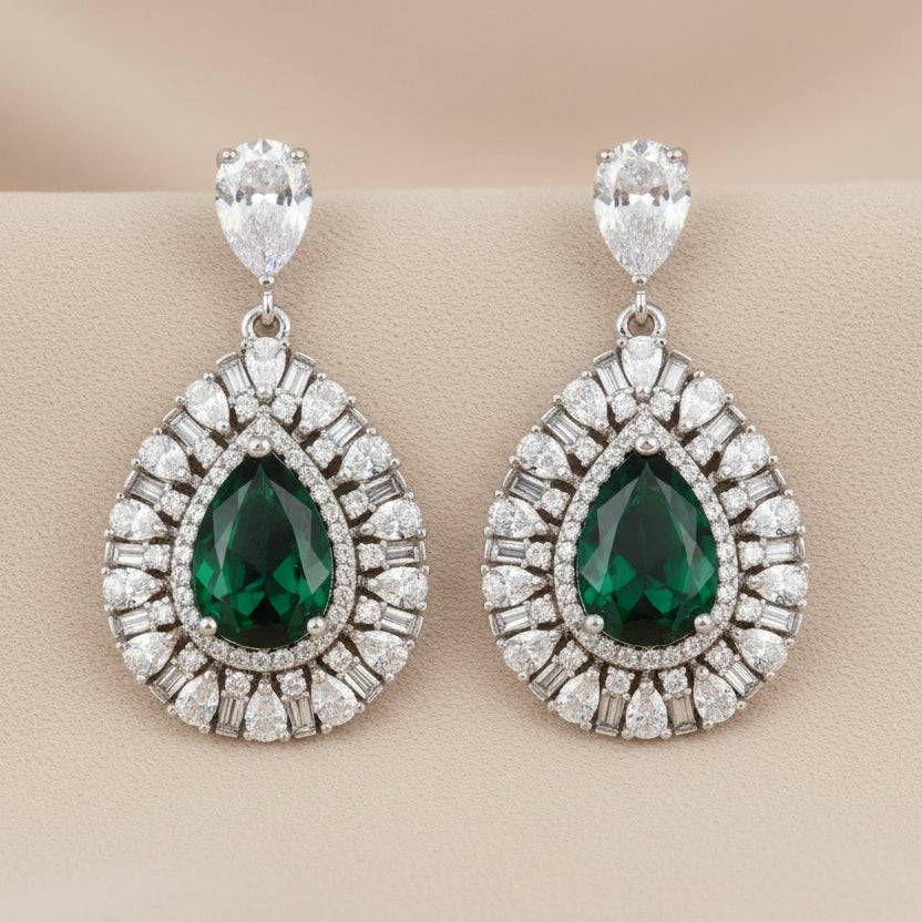 Elegant Bound Jewels rhodium drop-shaped earrings featuring sparkling zircon stones.