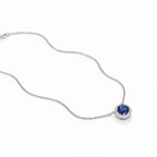 Rhodium-plated Bound Jewels Royale round pendant featuring 3A zircon in an elegant design.